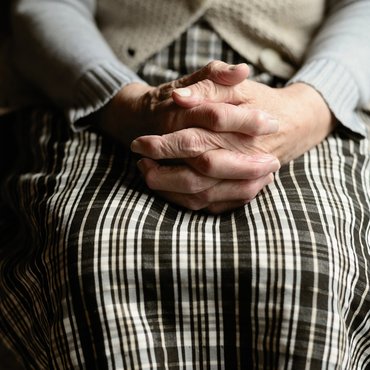 Older woman sat down