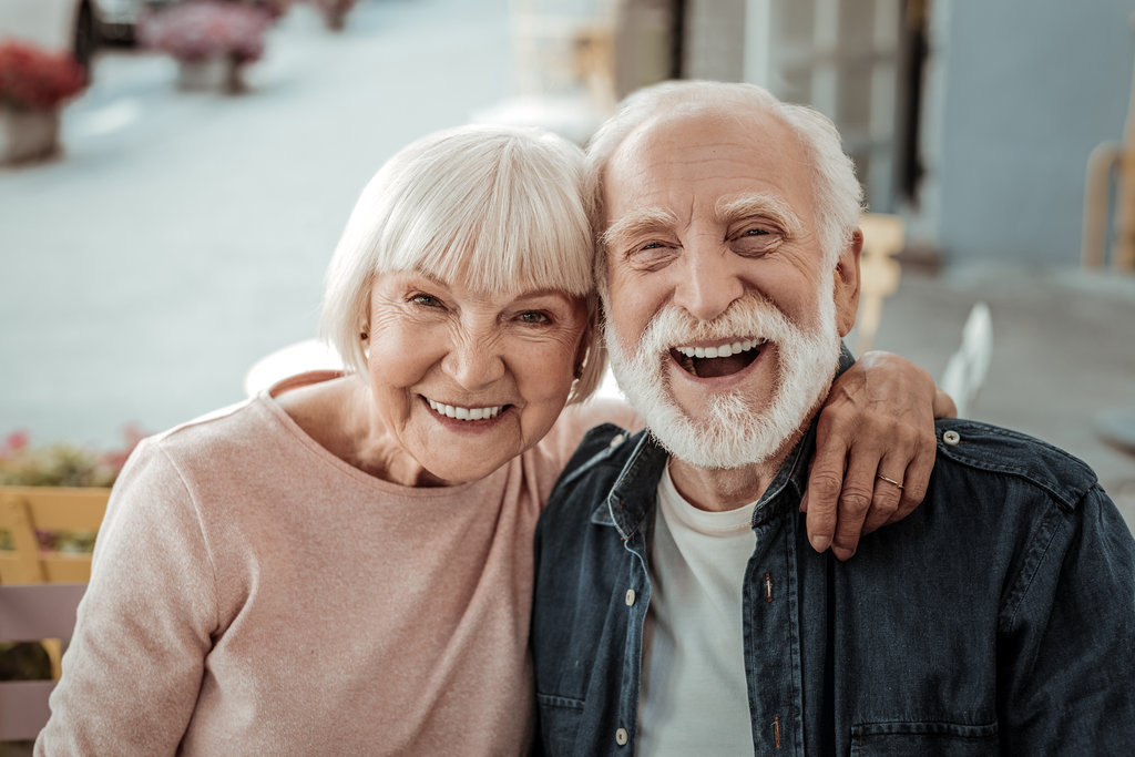 Happy man and woman smiling