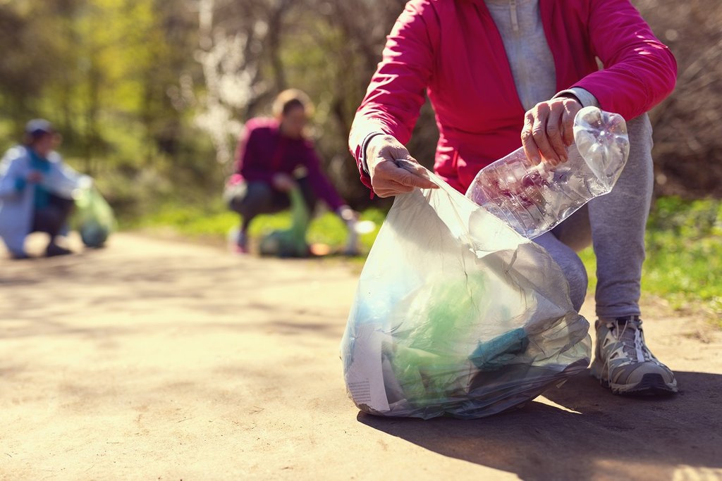 Volunteer picking up rubbish