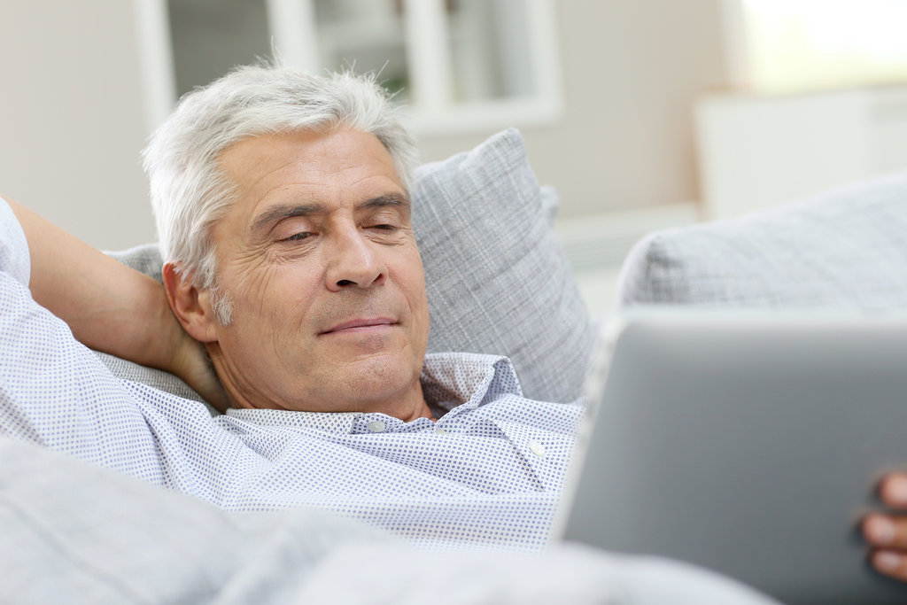 Man using a tablet device
