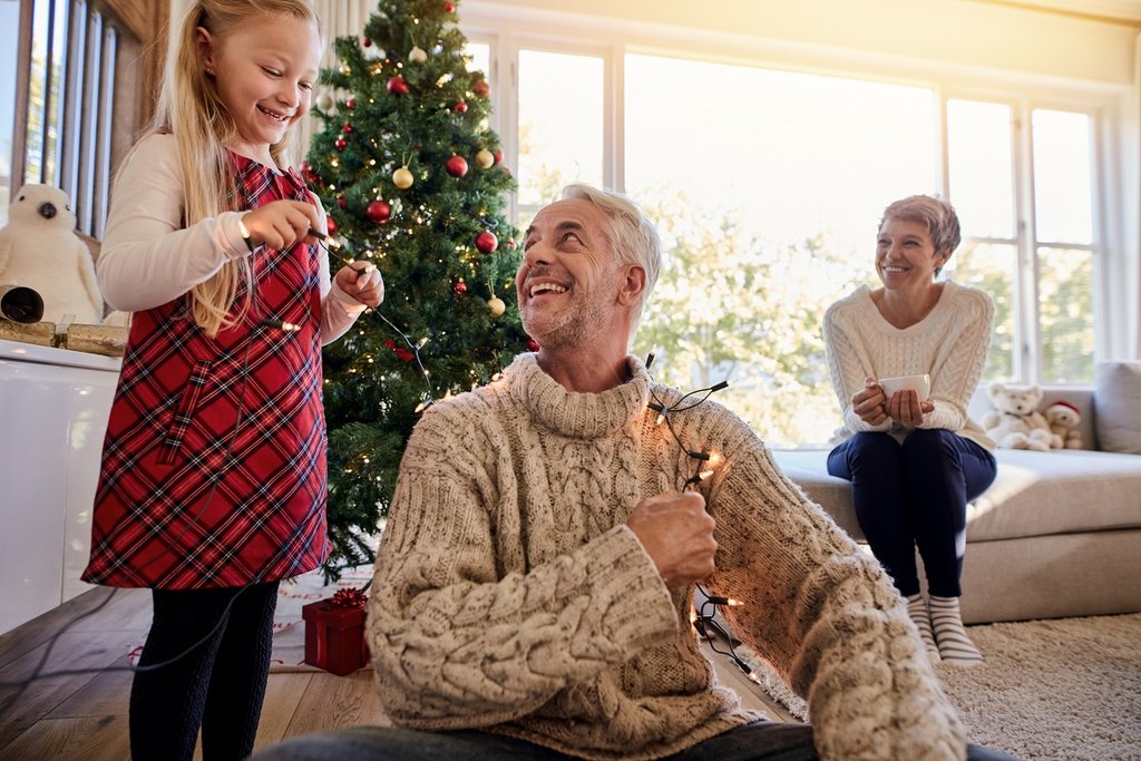 Grandparents and grandchild at Christmas