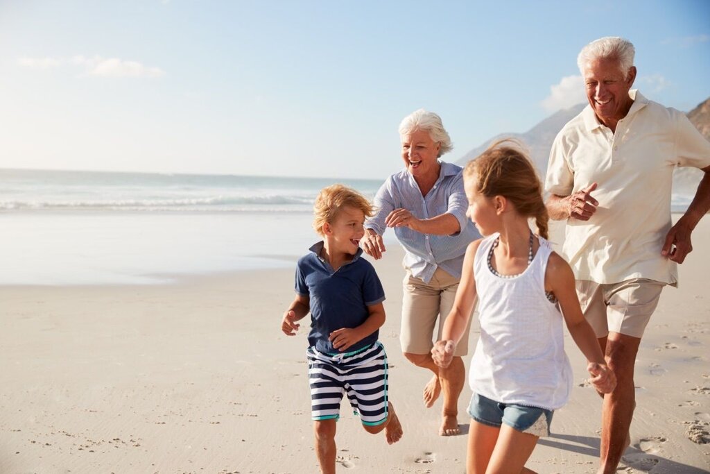 Grandparents and grandchildren on the beach