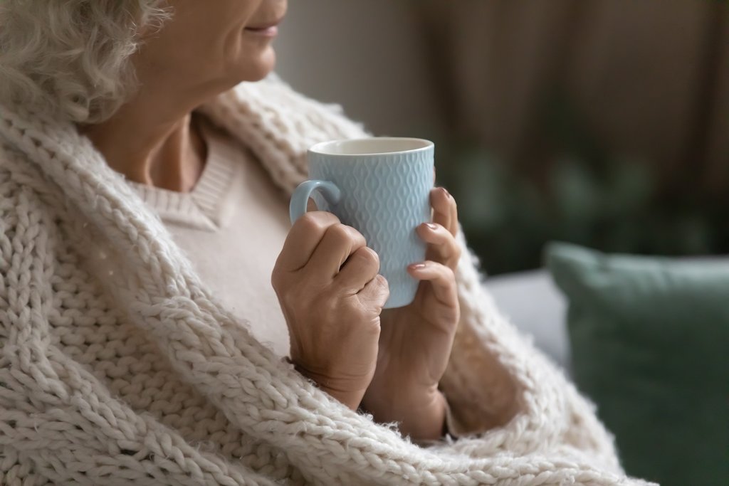 Older woman with cup of tea