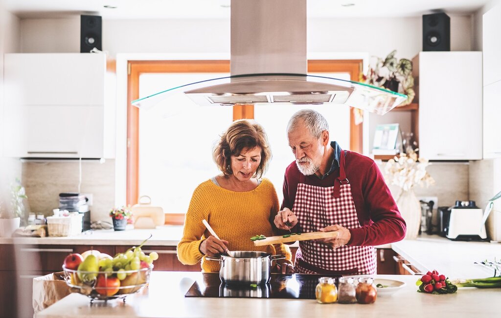 Older couple cooking