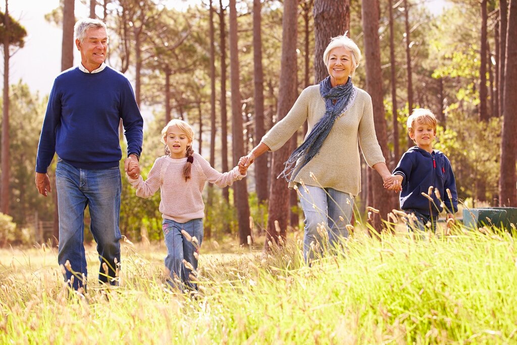 Grandparents and children on walk