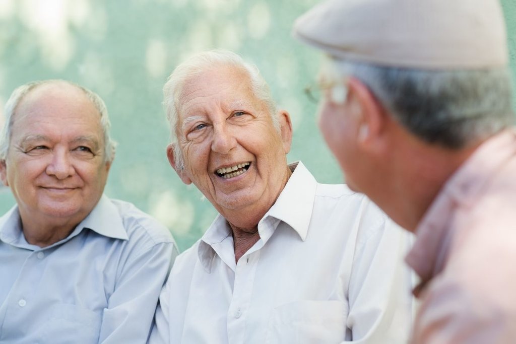 Men sitting talking