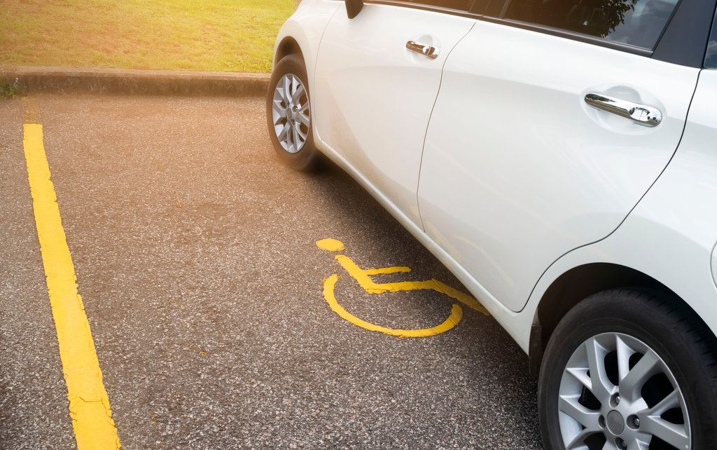 Car in disabled parking space