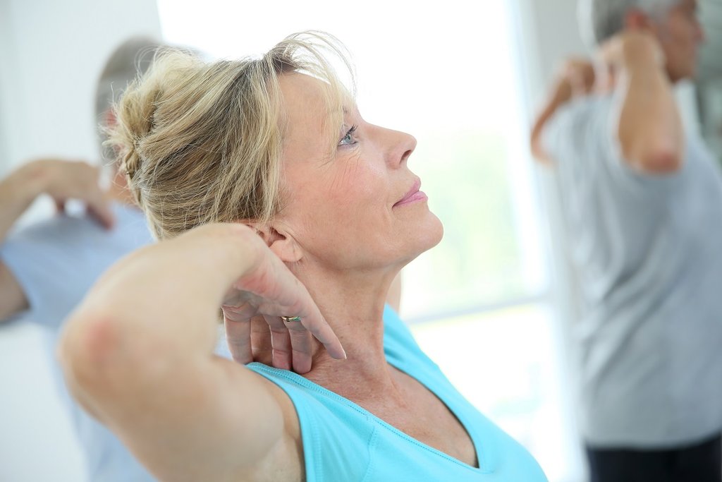 older woman in fitness class