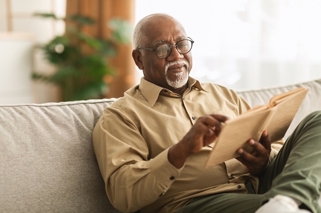 Retired man on sofa