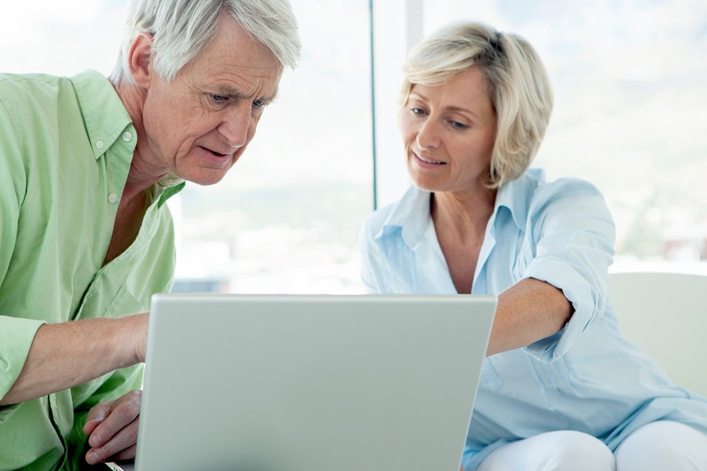 retired couple with laptop