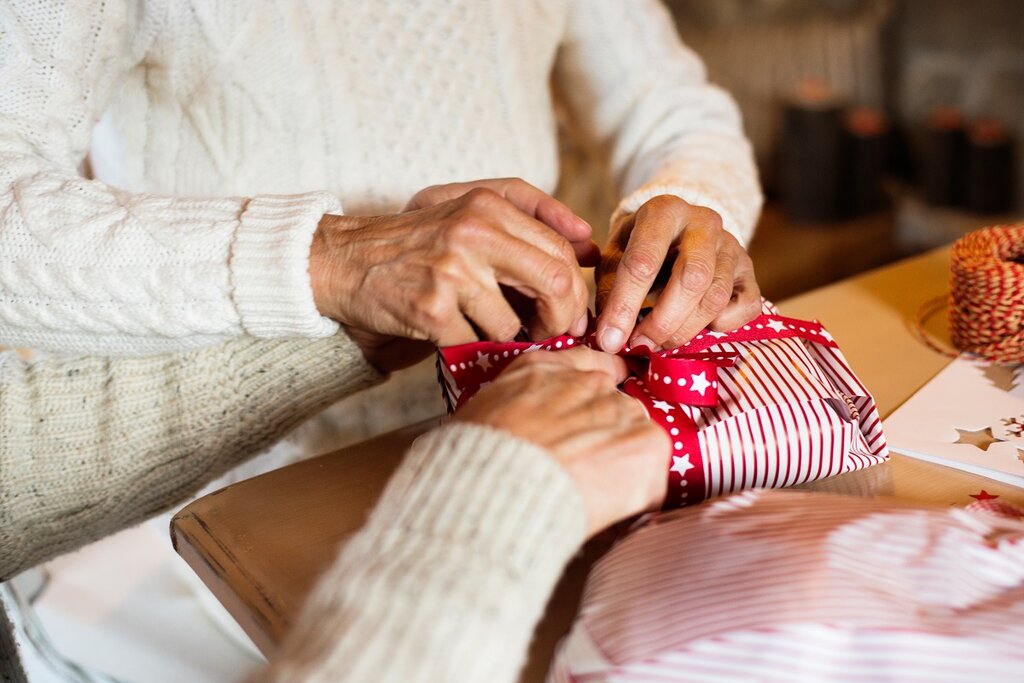 Woman wrapping Christmas presents