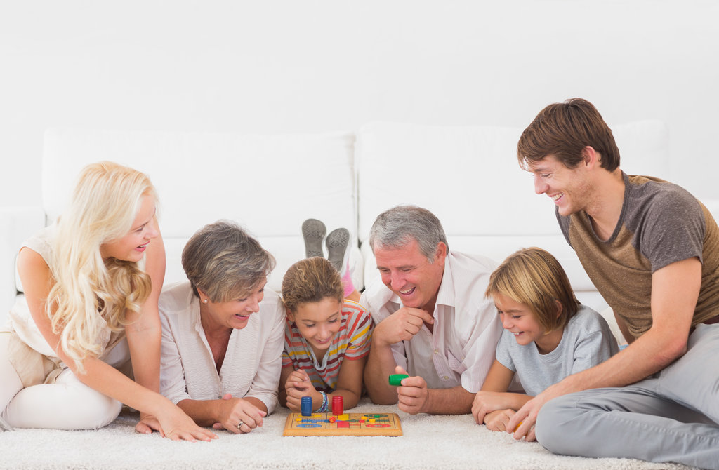 Family playing a board game