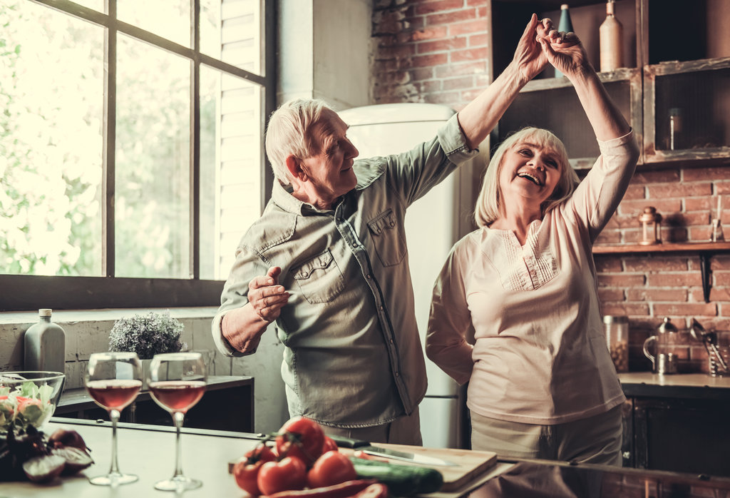 Older man and woman dancing 