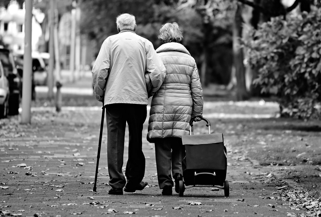 Elderly couple walking