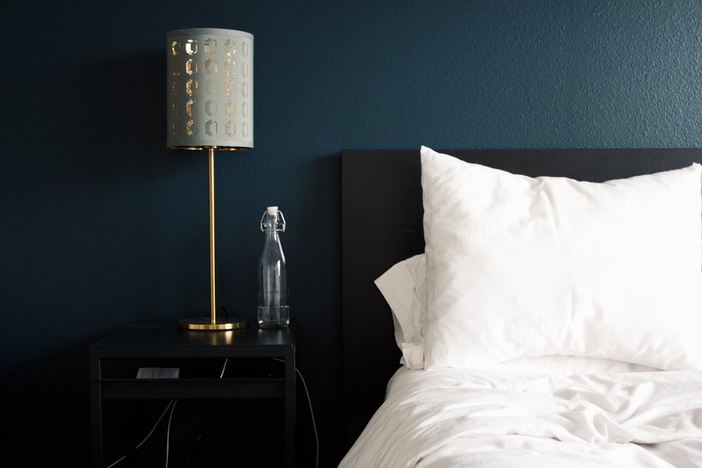Bedside table and bed