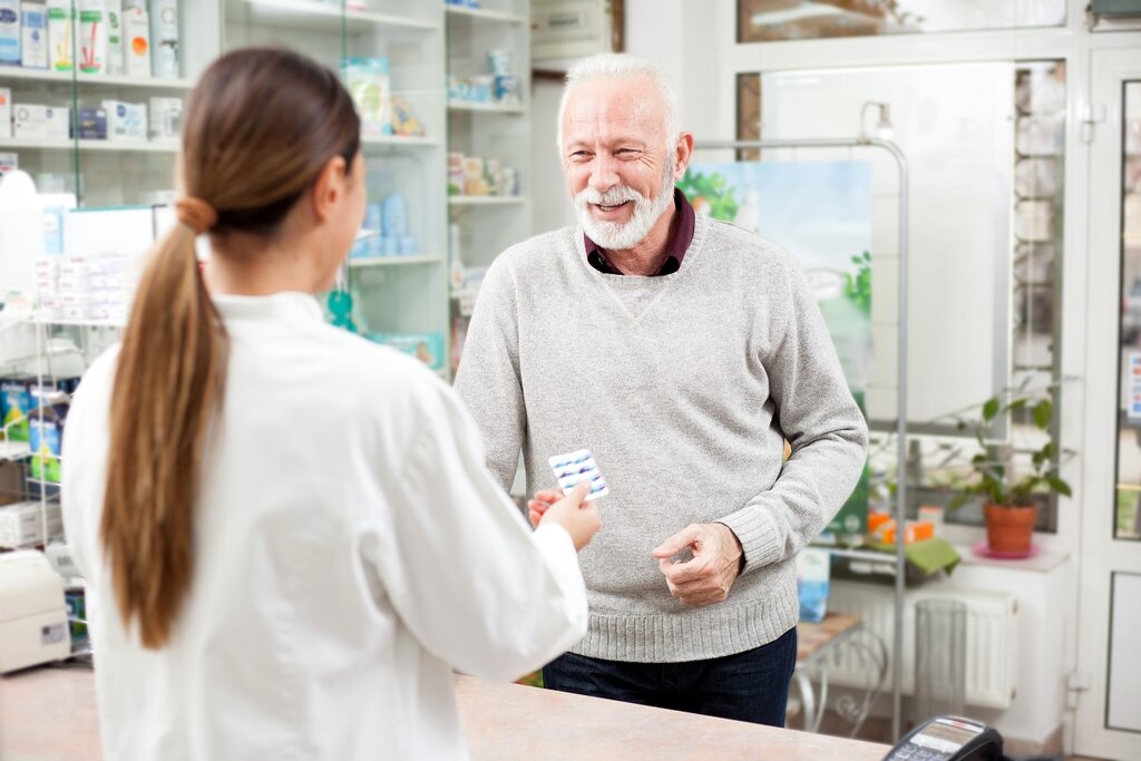 Older man in pharmacy