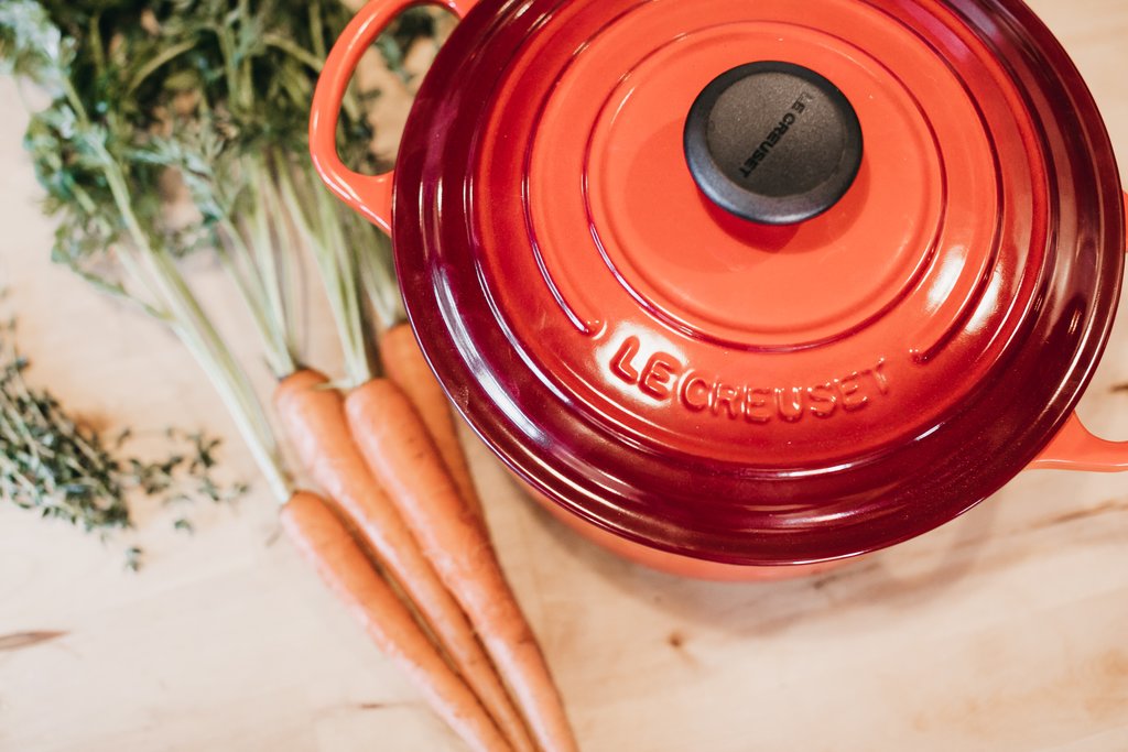 A casserole dish and carrots