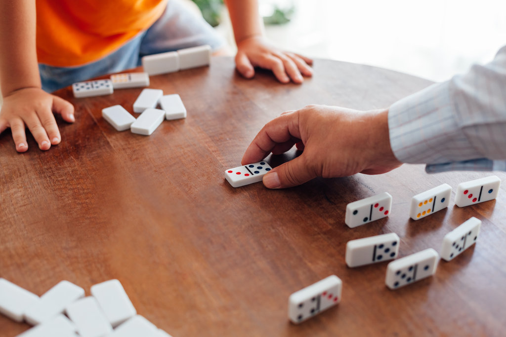 People playing Dominoes