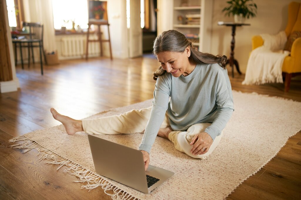 Older woman doing stretches