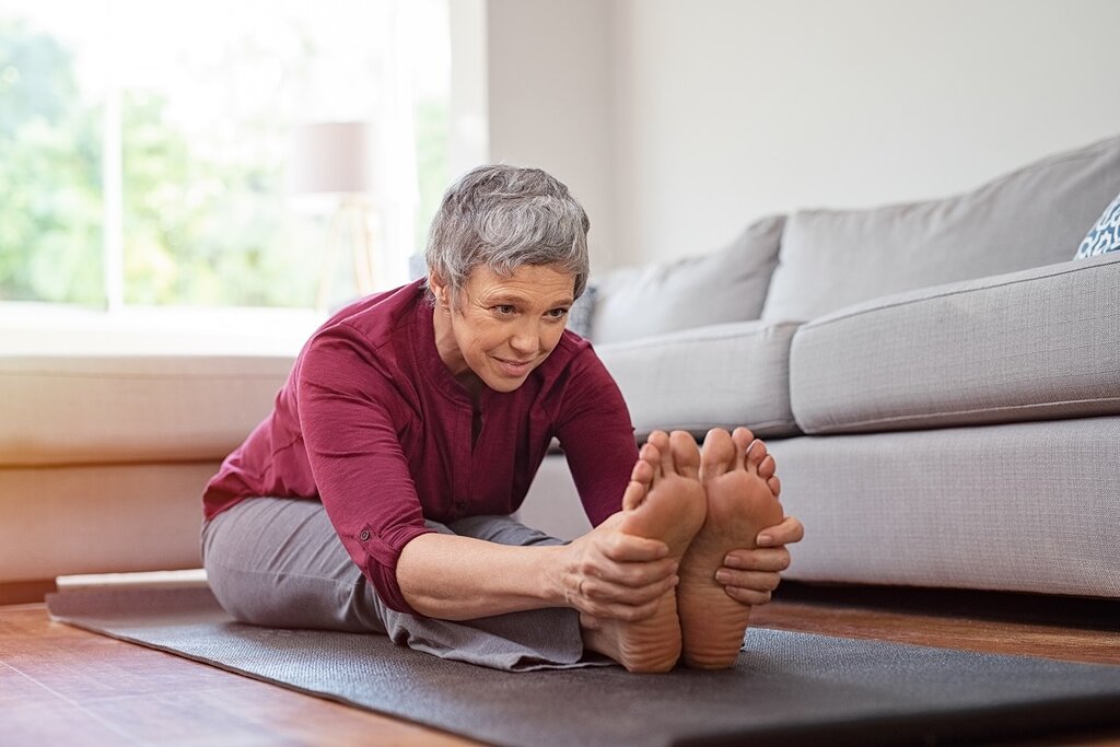 Older woman stretching