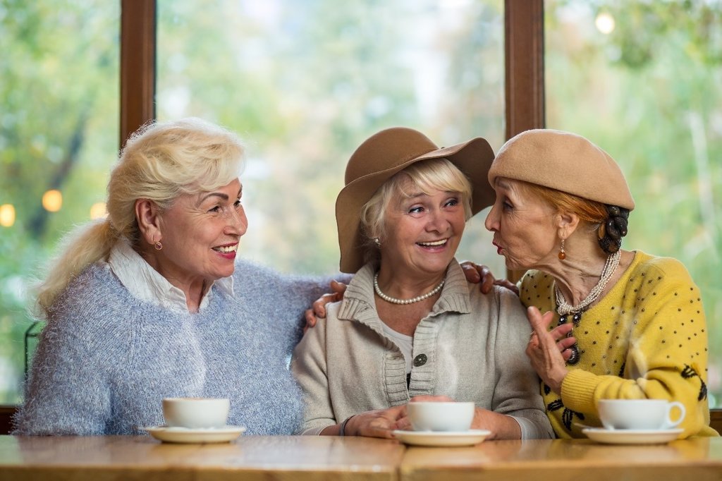 Three women laughing 