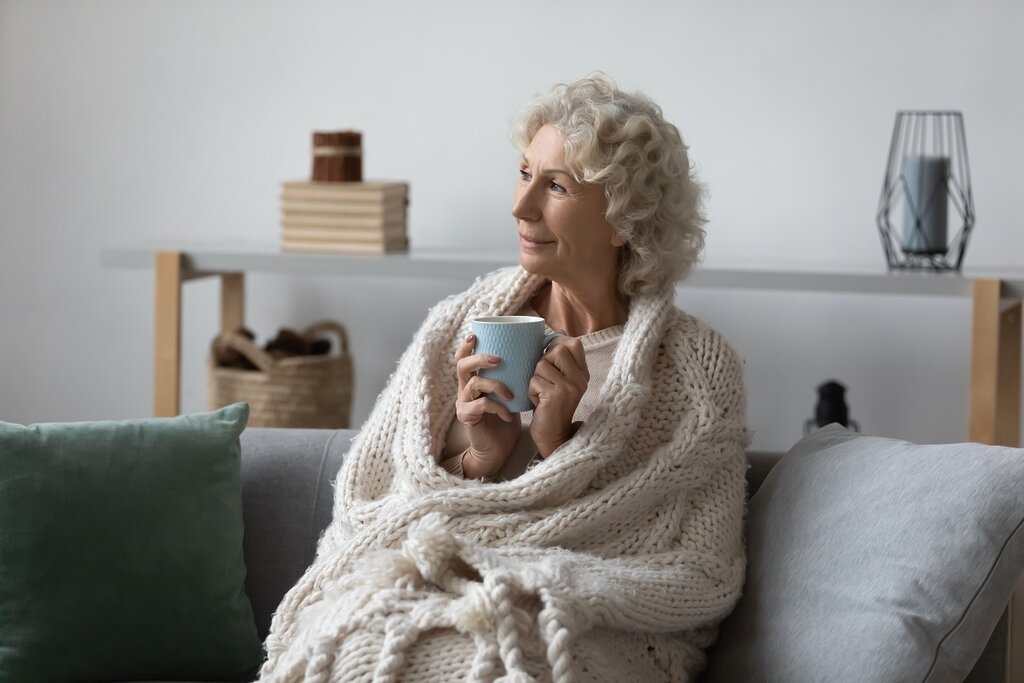 Older woman with cup of tea