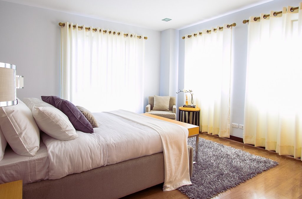 Bedroom with curtains closed