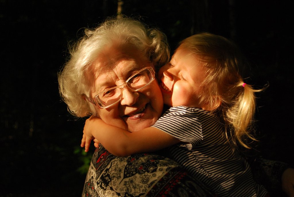 Grandmother hugging grandchild