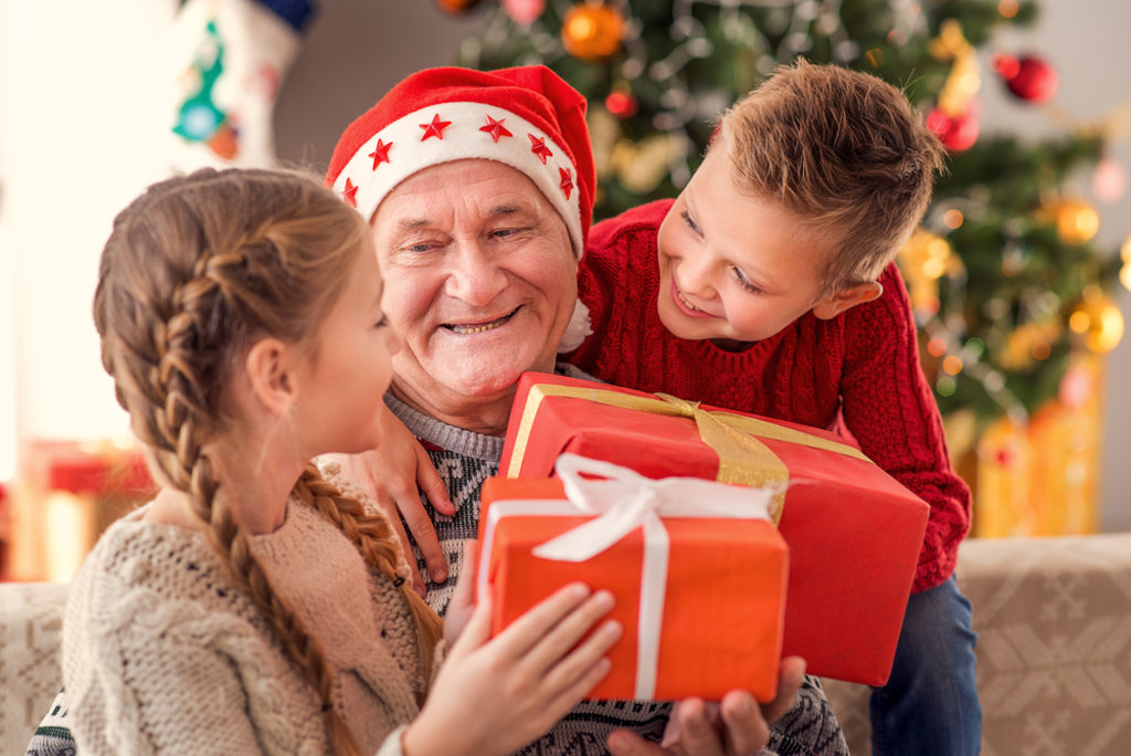 Grandparents with grandchildren at Christmas