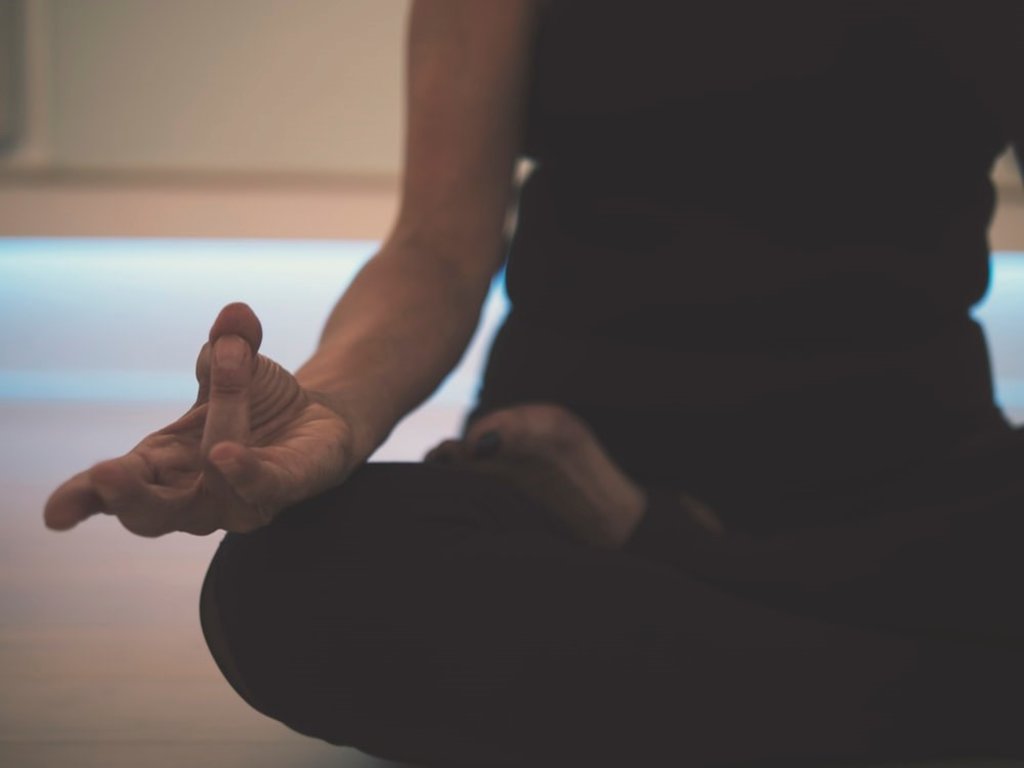 A person practicing yoga