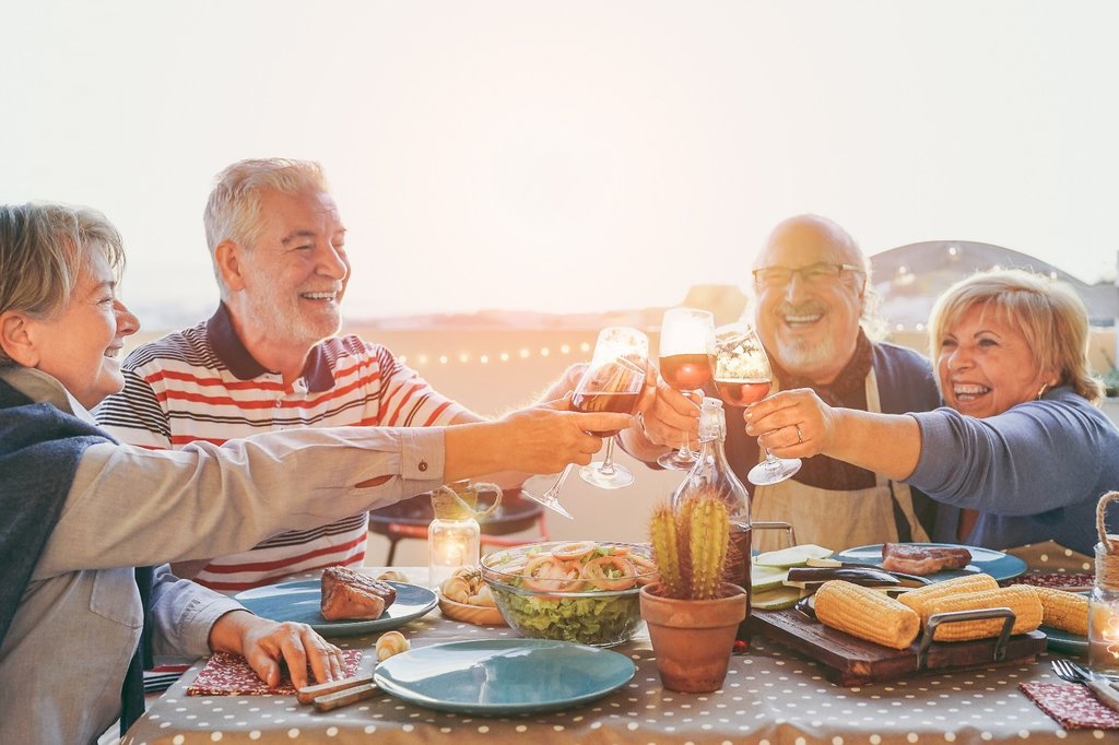 Older people having a meal